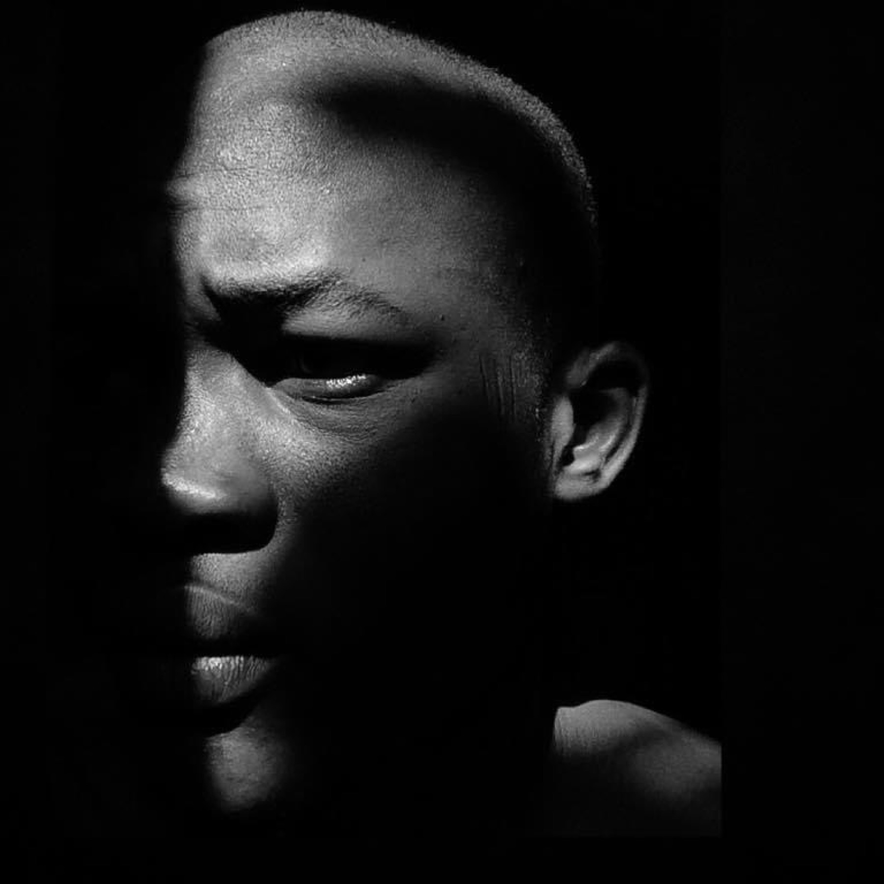 Black and white portrait of Omran Adam